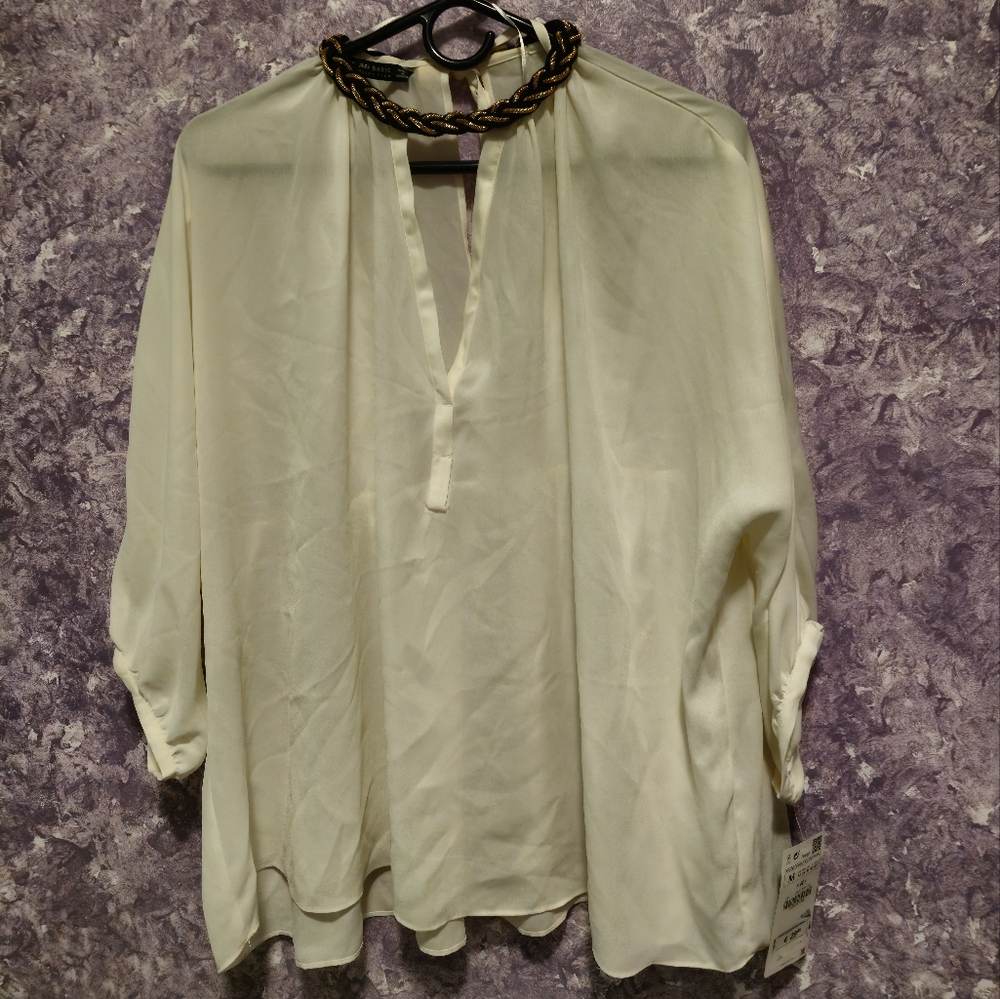 Top with decorative collar